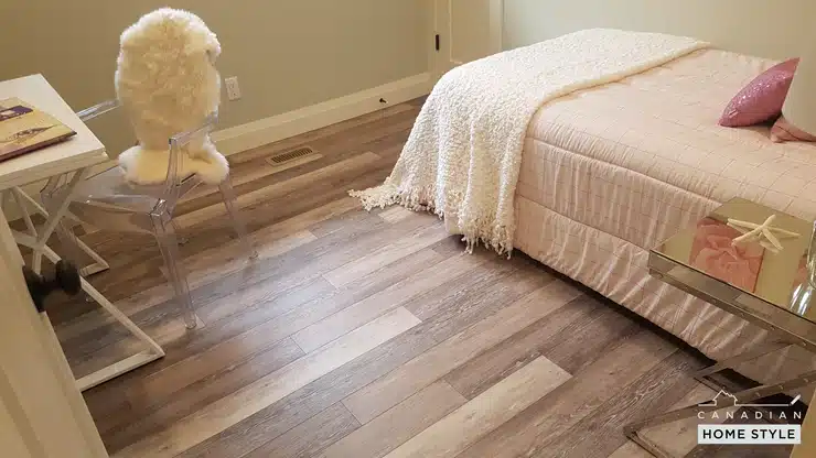 A bedroom with a Torlys vinyl bed and a Torlys vinyl desk.