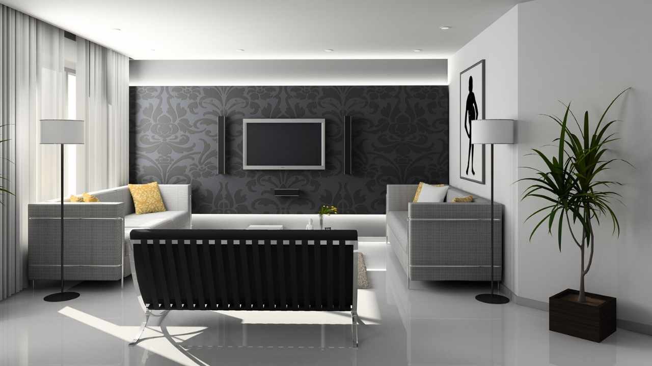 A modern living room with black and white furniture.