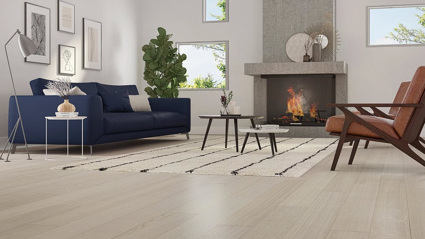 A living room with hardwood floors and a fireplace.