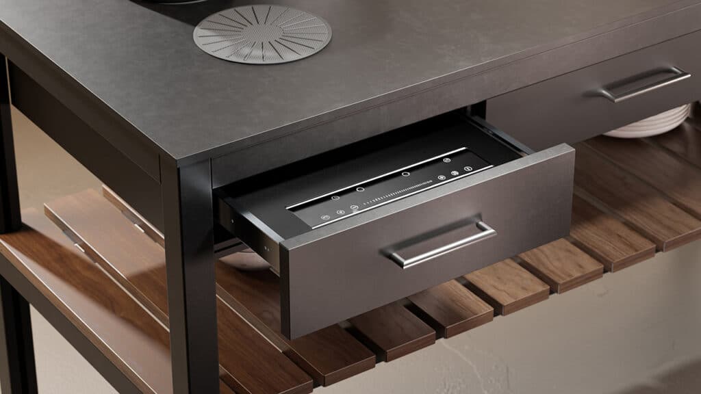 A kitchen island with a drawer and a sink.