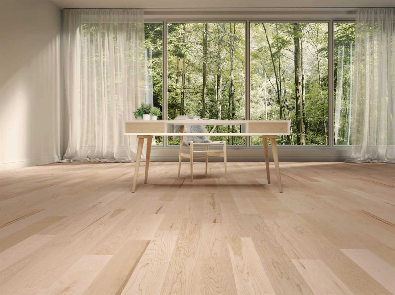 A room with wood floors and a desk.