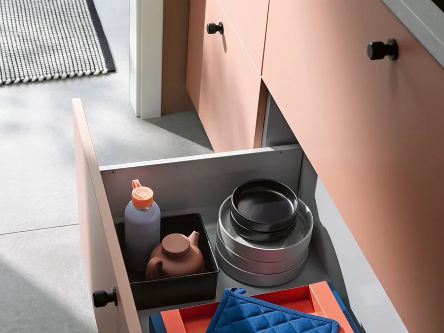 Full-height pale cabinetry drawing the eye upward in a small Vancouver kitchen