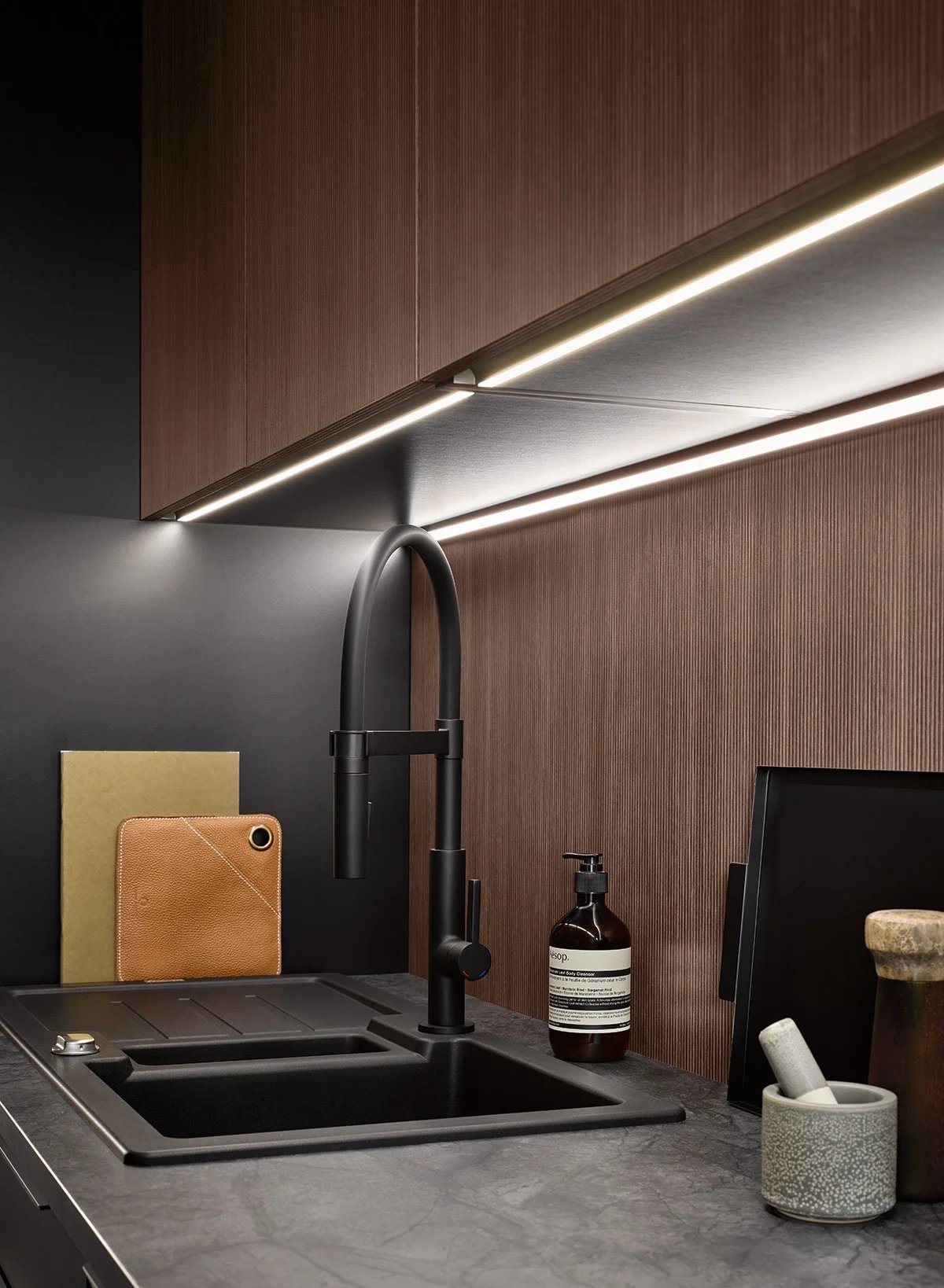 High-gloss handleless Bauformat kitchen cabinets in a Vancouver home