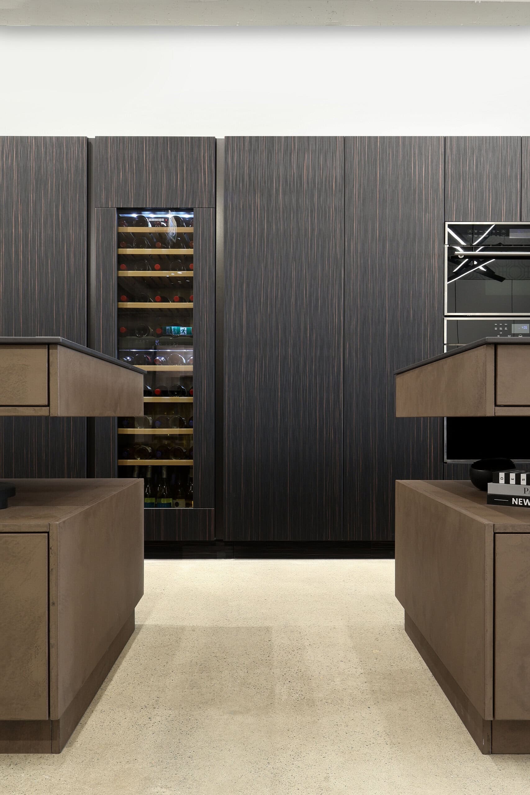 Canadian Home Style kitchen inspiration — ebony fronts, integrated wine wall