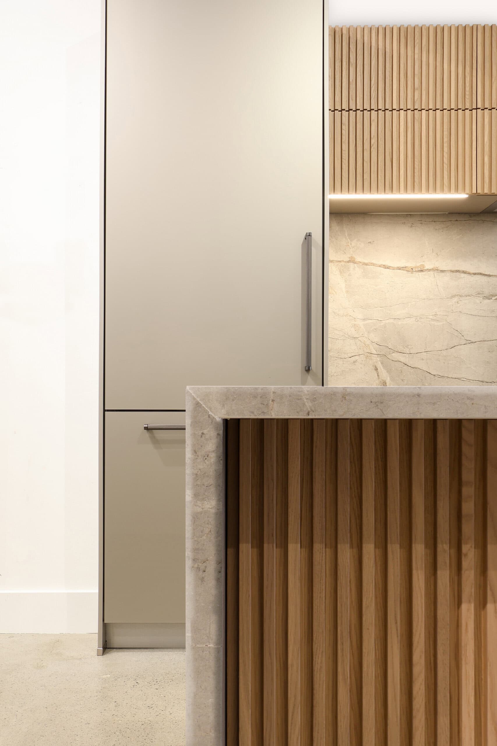 Canadian Home Style kitchen inspiration — fluted white oak, metallic-glass door