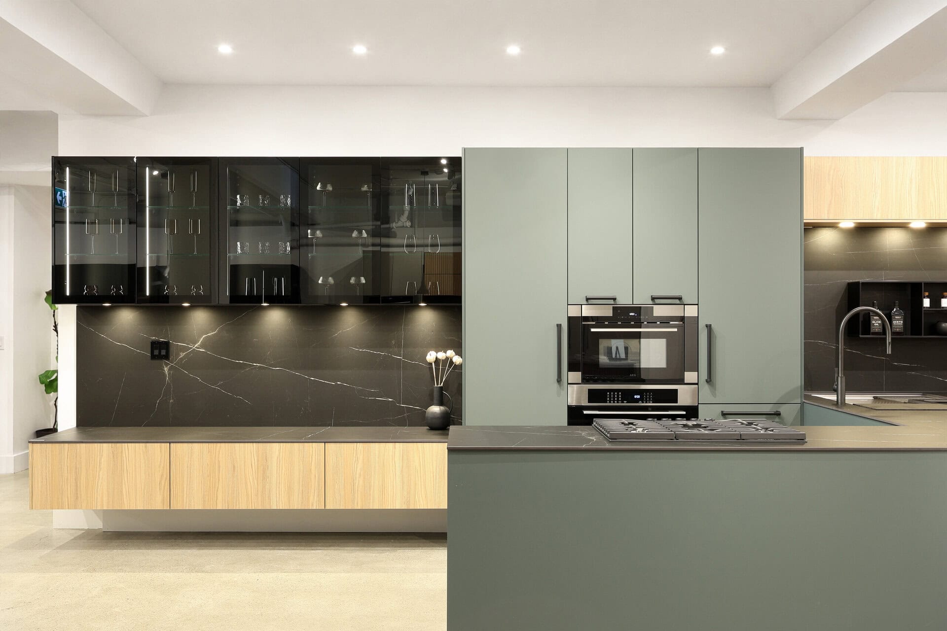 Canadian Home Style kitchen inspiration — island with lit glass display