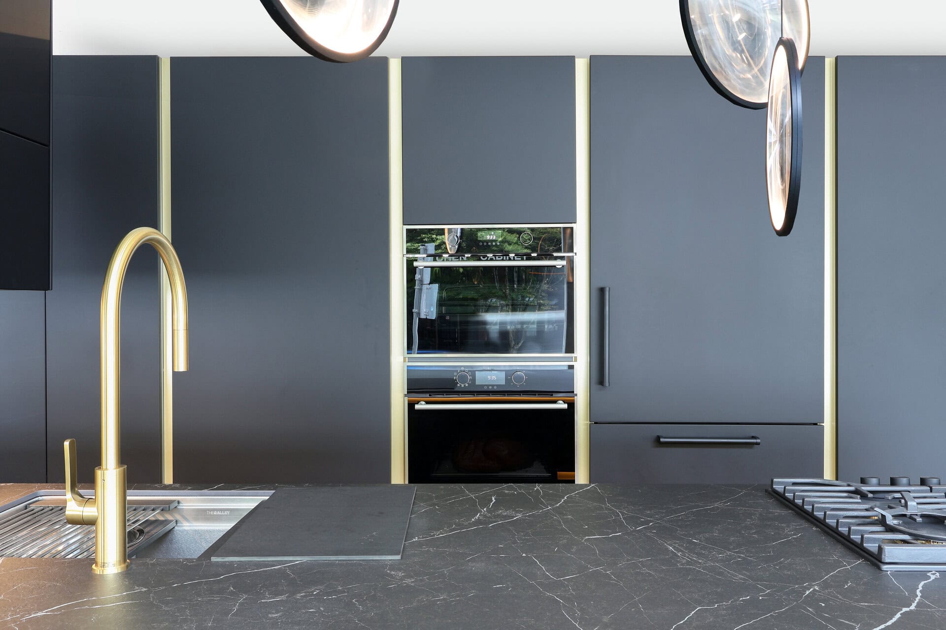 Canadian Home Style kitchen inspiration — slate black with brass reveal