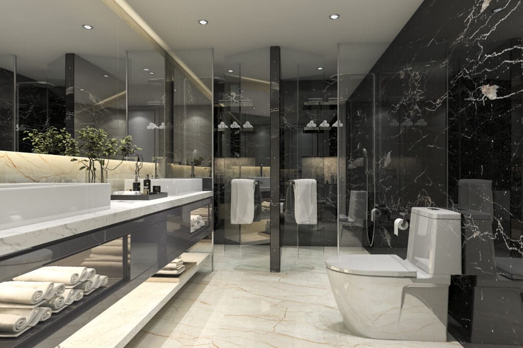 A black and white bathroom with marble walls in Vancouver.