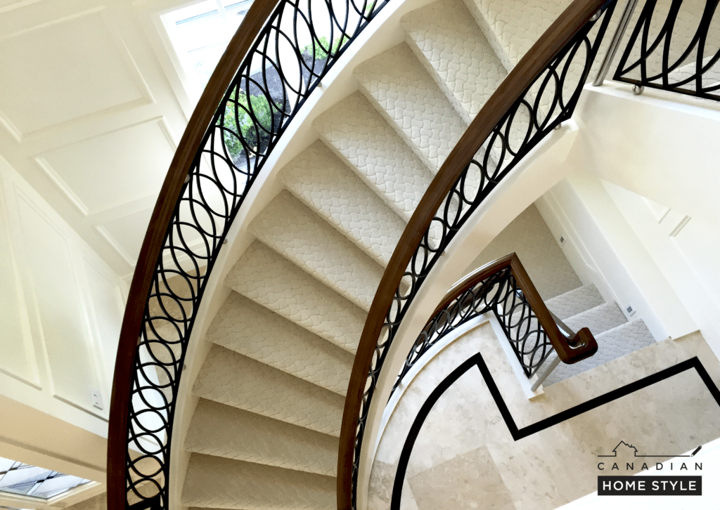 A home with a black railing.