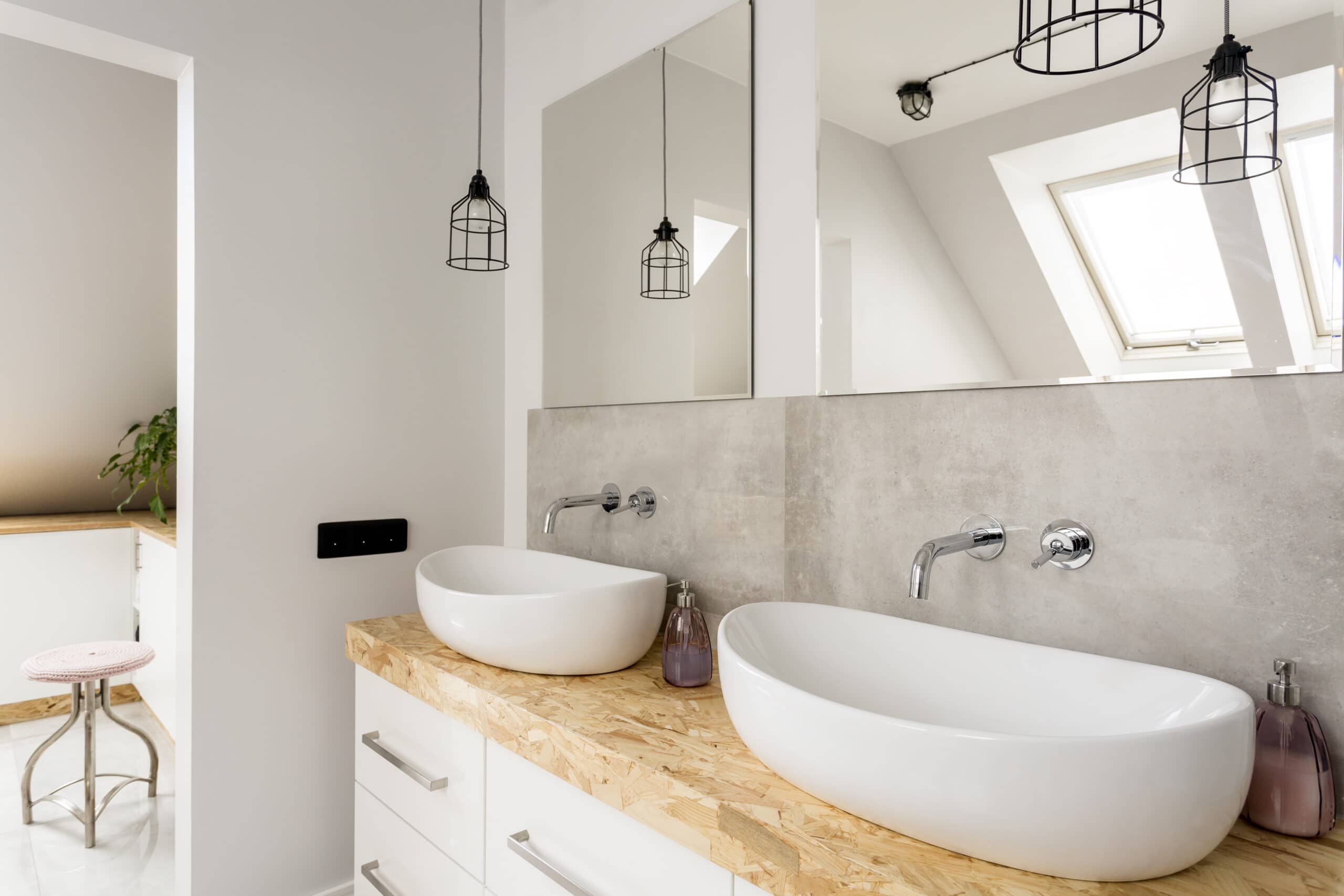 Vancouver Renovation Photos: Two white sinks in a modern bathroom.