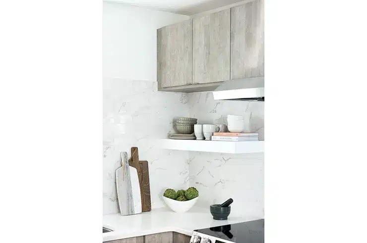 kitchen cabinets that are gray with open shelves 