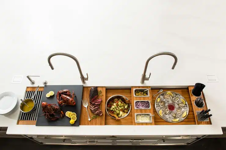 A Galley Workstation with a variety of food on it.