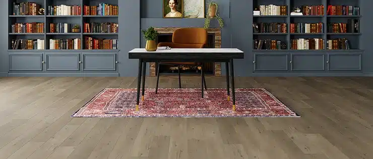 Vinyl flooring Vancouver: A room with blue walls adorned with Mannington Adura bookshelves.