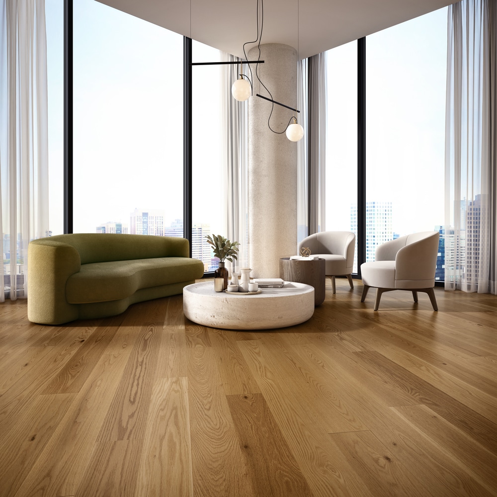 A living room adorned with Mercier hardwood flooring and large windows.