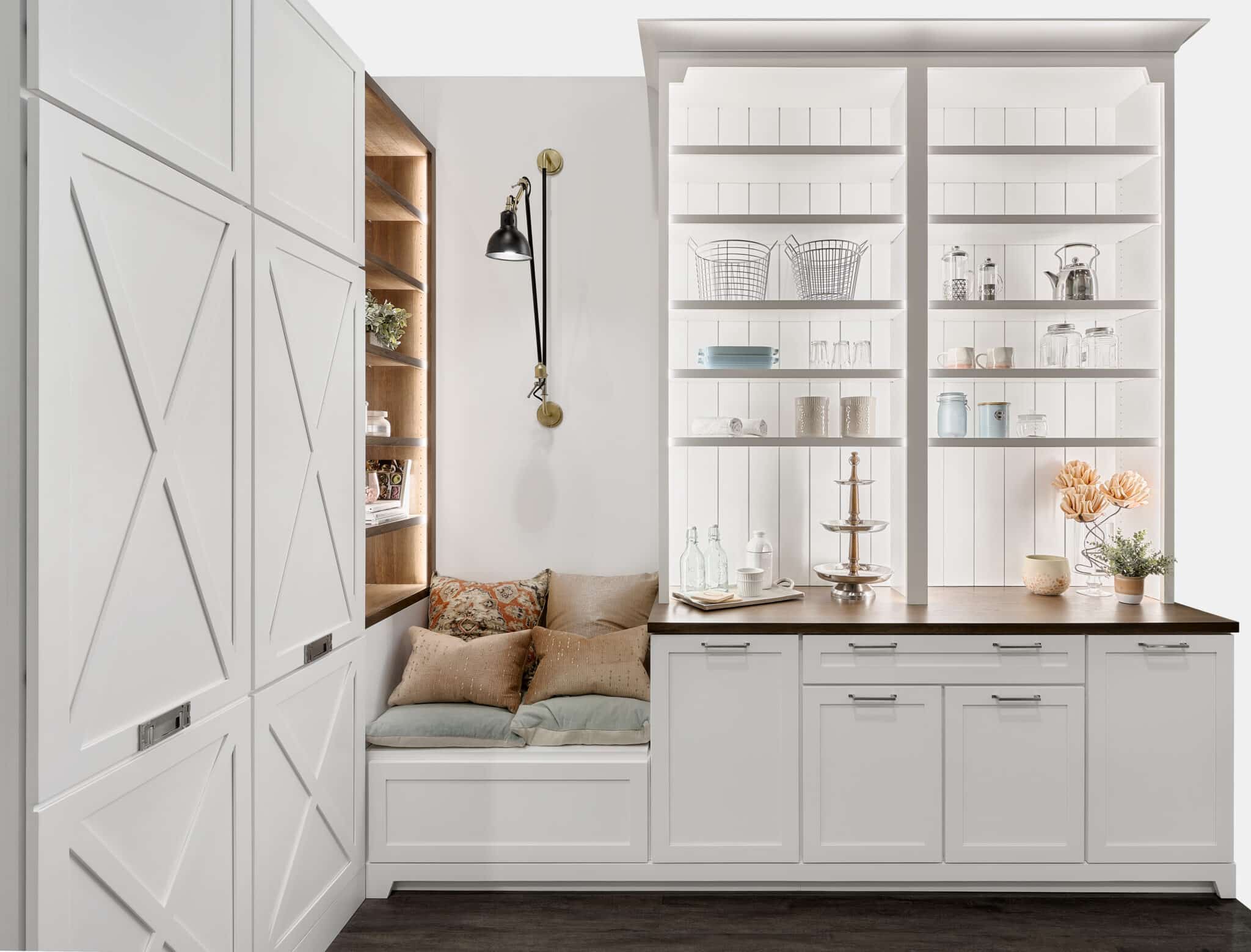 A Canadian Home style kitchen with white shelves and a bench.