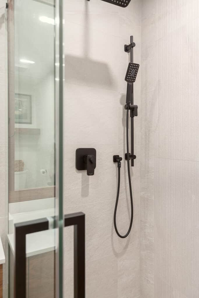 black fixtures in a custom bathroom