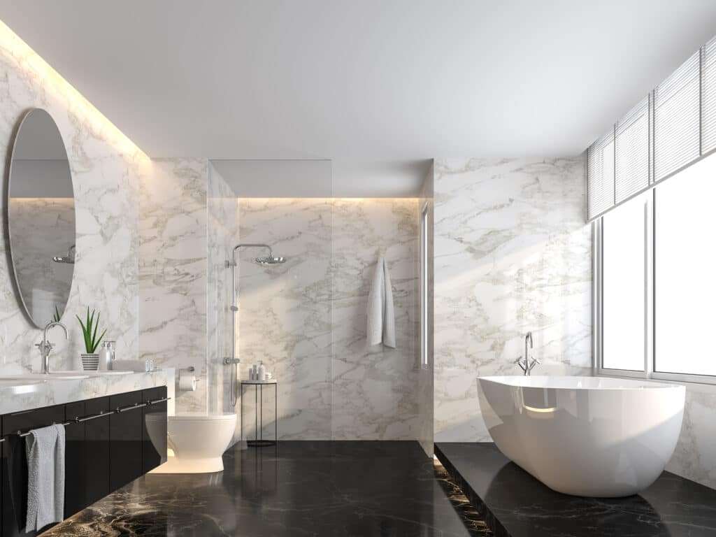 A bathroom with magnificent marble floors and an elegant freestanding bathtub.