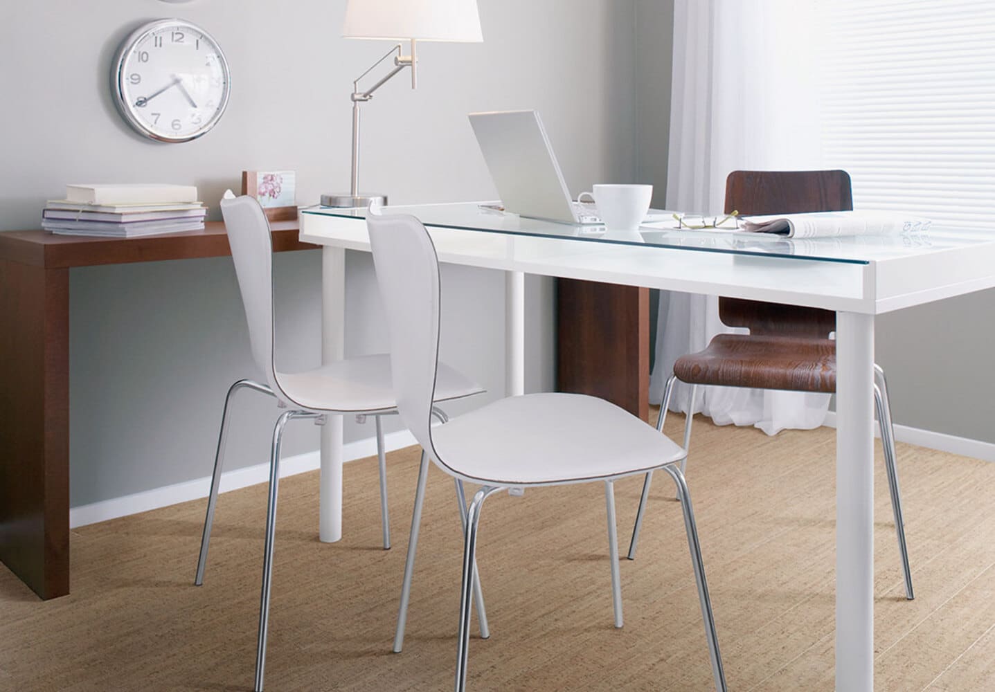 Vancouver cork flooring: A white desk and chair in a home office, designed with Amorim Wise influence.