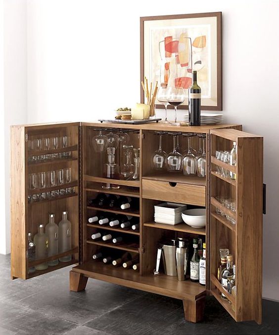 Adding a bar or drink cart is excellent for creating a dedicated social area in your kitchen.