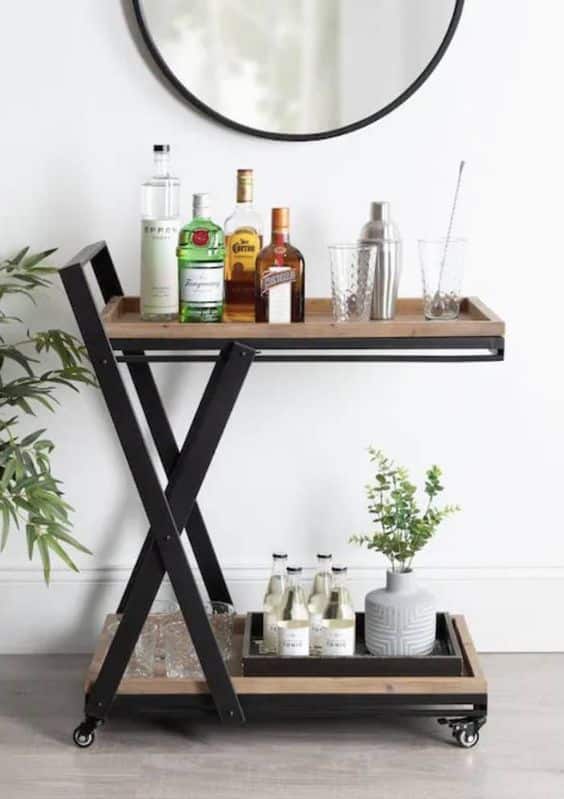 Adding a bar or drink cart is excellent for creating a dedicated social area in your kitchen.