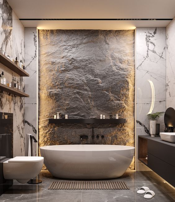 A sleek and contemporary bathroom featuring exquisite marble walls and a luxurious bathtub, ideal for a stunning Bathroom Renovation in West Vancouver.