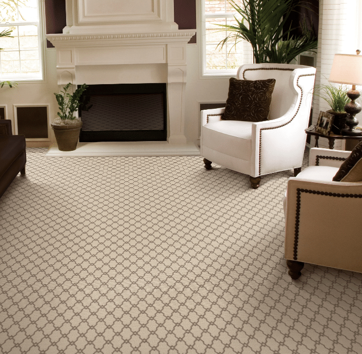 A living room with beige carpet and a fireplace featuring vinyl flooring in West Vancouver.